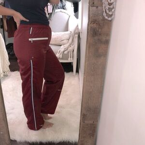 Nike size medium burgundy track pants/joggers